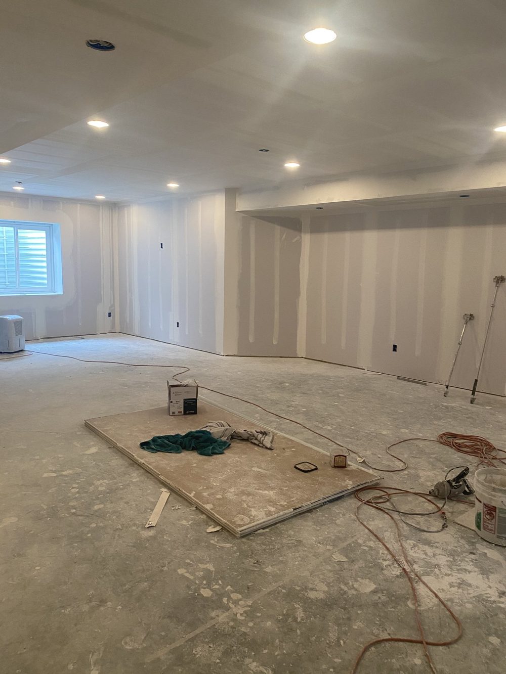 Basement in progress with framing and drywall going up