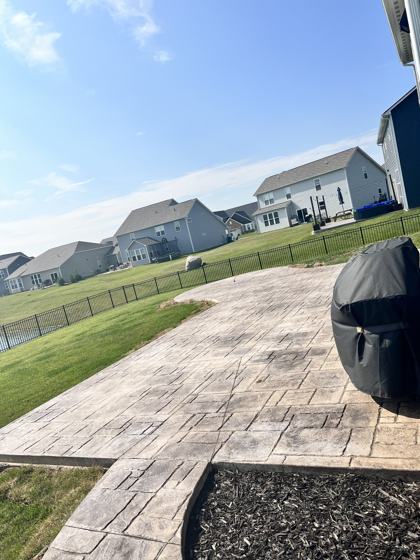 Stamped concrete patio work by OnCall Home Co.