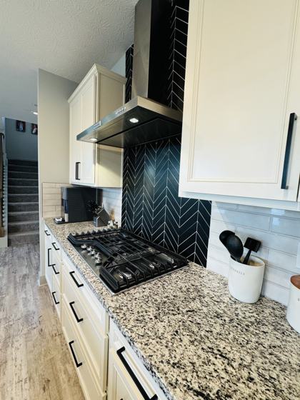 Kitchen backsplash and tile work by OnCall Home Co.