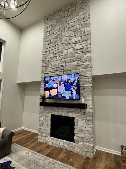 Fireplace and trim work by OnCall Home Co.