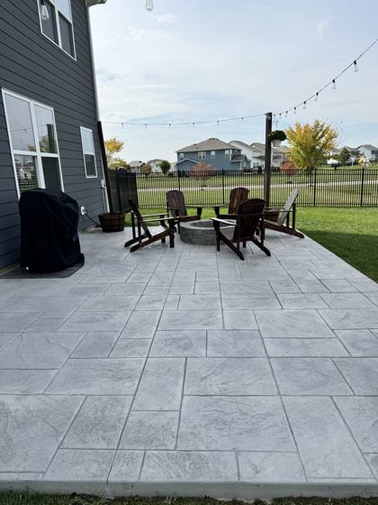 Stamped concrete patio work by OnCall Home Co.
