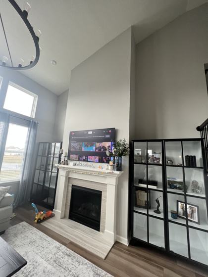Fireplace and trim work by OnCall Home Co.