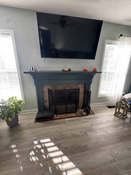 Fireplace and trim work by OnCall Home Co.