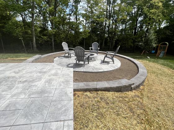 Stamped concrete patio work by OnCall Home Co.