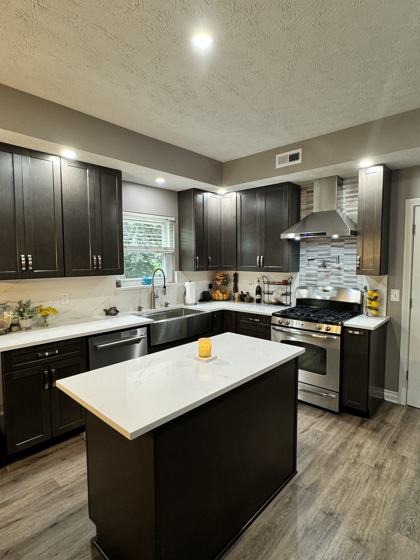 Kitchen backsplash and tile work by OnCall Home Co.