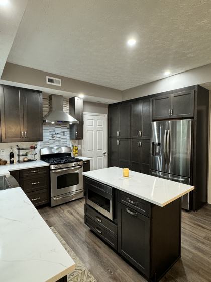 Kitchen backsplash and tile work by OnCall Home Co.
