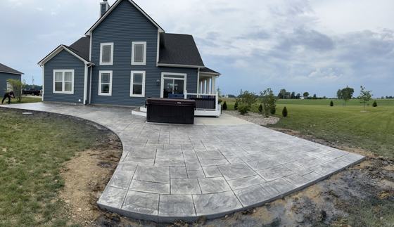 Stamped concrete patio work by OnCall Home Co.