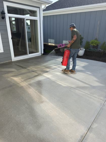 Stamped concrete patio work by OnCall Home Co.