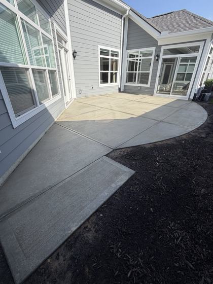 Stamped concrete patio work by OnCall Home Co.
