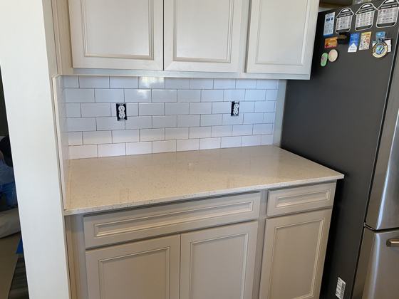 Kitchen backsplash and tile work by OnCall Home Co.