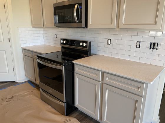 Kitchen backsplash and tile work by OnCall Home Co.