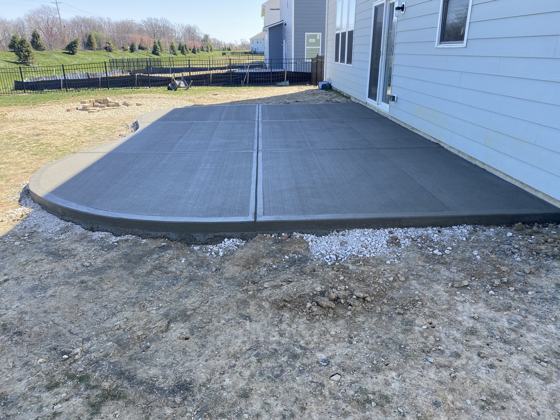 Stamped concrete patio work by OnCall Home Co.