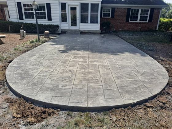 Stamped concrete patio work by OnCall Home Co.
