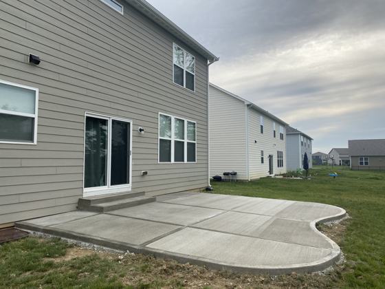 Stamped concrete patio work by OnCall Home Co.