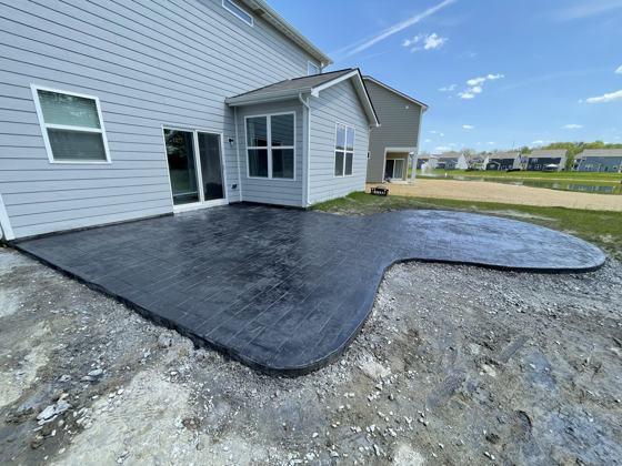 Stamped concrete patio work by OnCall Home Co.