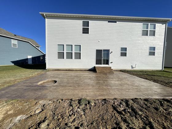 Stamped concrete patio work by OnCall Home Co.
