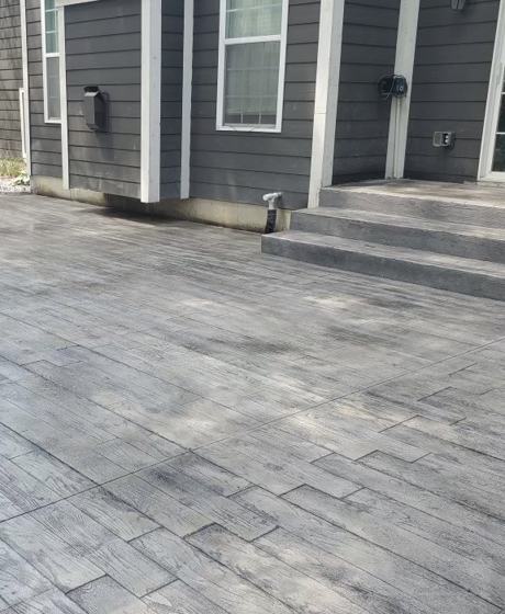 Stamped concrete patio work by OnCall Home Co.