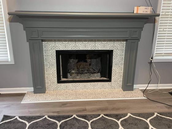 Fireplace and trim work by OnCall Home Co.
