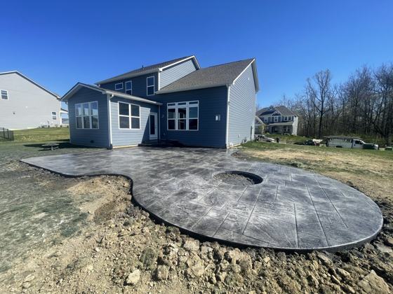 Stamped concrete patio work by OnCall Home Co.