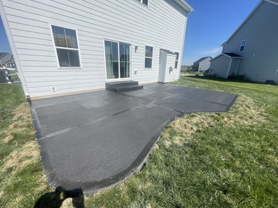 Stamped concrete patio work by OnCall Home Co.