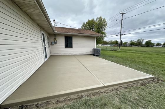 Stamped concrete patio work by OnCall Home Co.