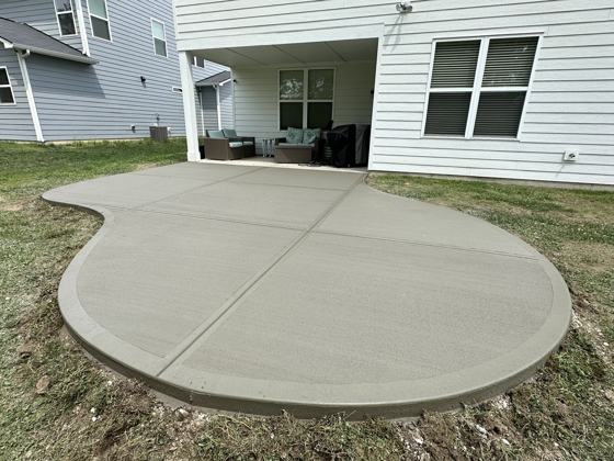 Stamped concrete patio work by OnCall Home Co.
