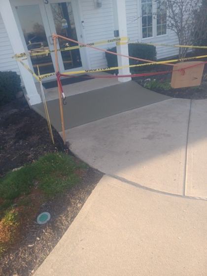 Stamped concrete patio work by OnCall Home Co.