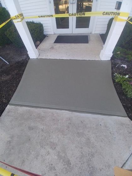 Stamped concrete patio work by OnCall Home Co.