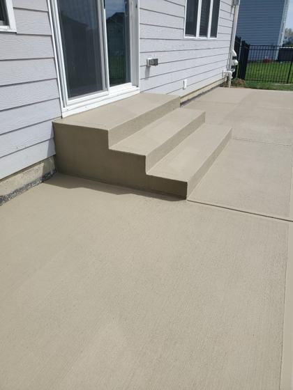 Stamped concrete patio work by OnCall Home Co.