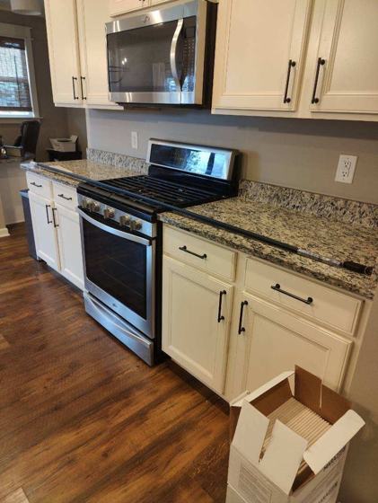 Kitchen backsplash and tile work by OnCall Home Co.