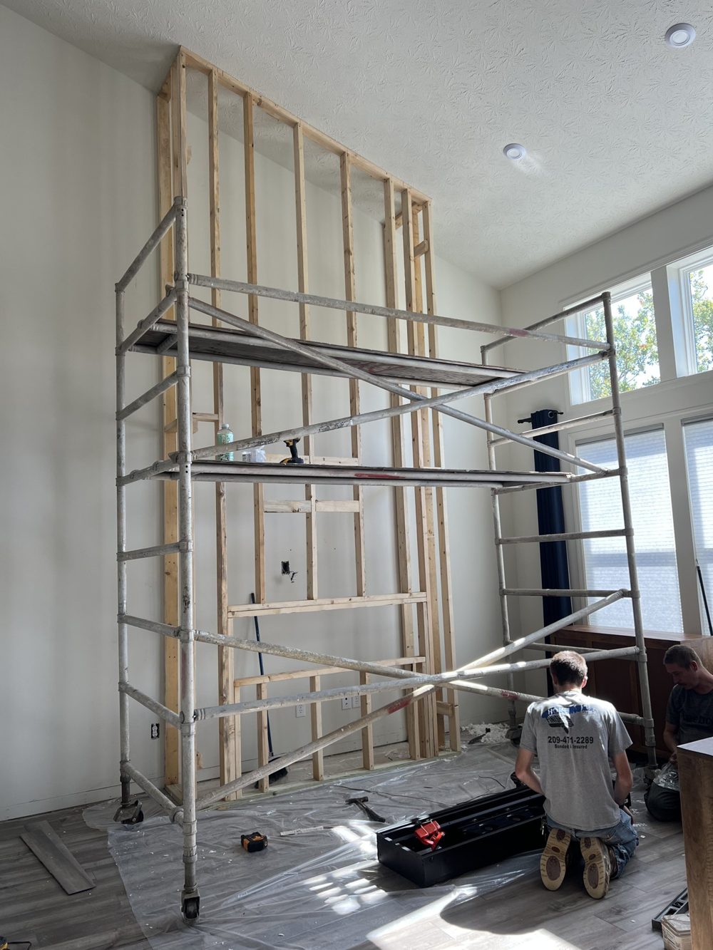 Scaffold set up in a two story great room for painting